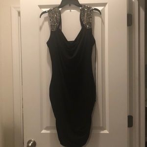 Black mini dress with studded straps